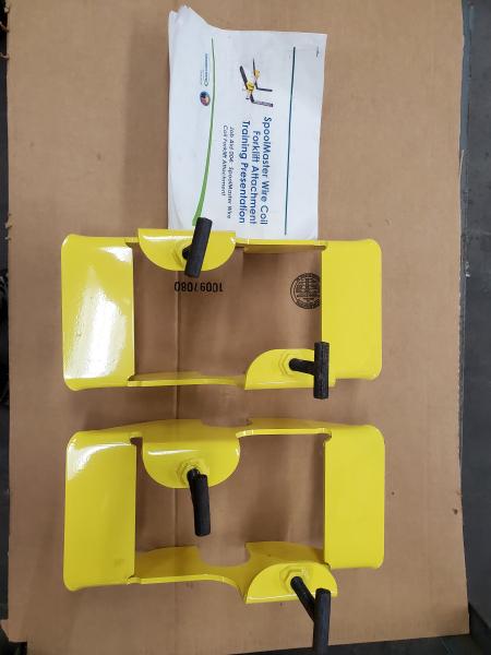 1 Set of New Spoolmaster Wire Coil Forklift Attachment.